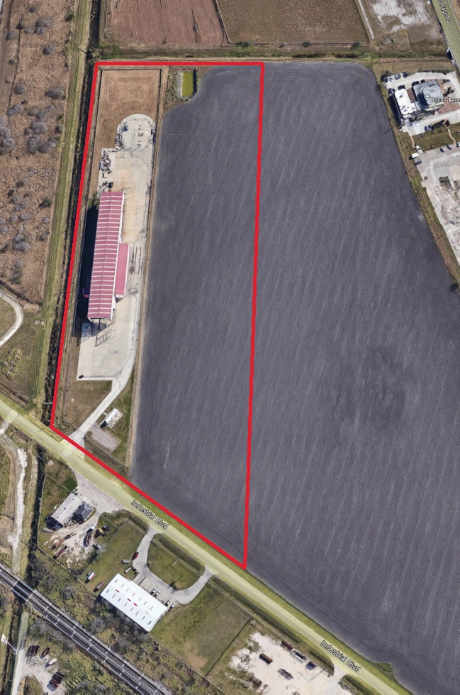 Original narrow property boundary marked in red